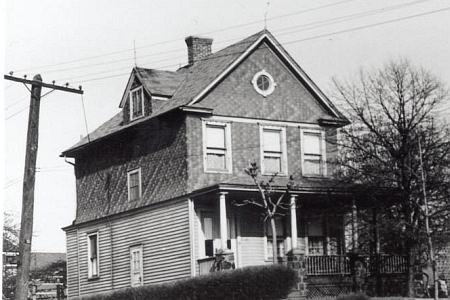 A house at 83rd Avenue and Kew Gardens Road, 1936 in Kew Gardens, NY.