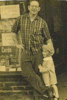 A young Bernard Titowsky outside his book shop with daughter, Barbara, some time during the early 1950's.