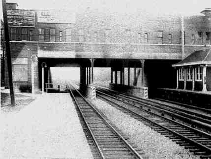 Looking east toward Jamaica from the Kew Gardens, NY Long Island Railroad Station c. 1929.  The eastbound waiting room to the right was taken down in the late 1970's.