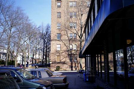 Kitty Genovese walked along the side of the two story Tudor building (on the right) headed for the rear of the building (behind the photographer).