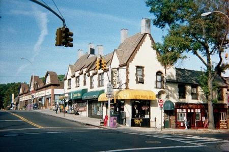 Two story Tudor Building at Lefferts Boulevard and Austin Street, Kew Gardens, NY.