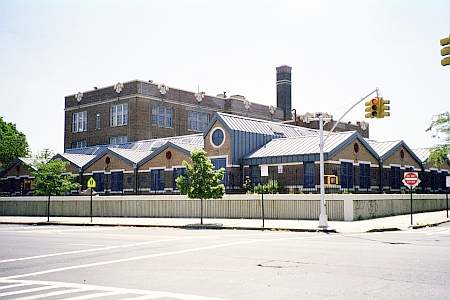 P.S. 54 can be seen in the background from 126th Street at Hillside Avenue in Richmond Hill, NY.